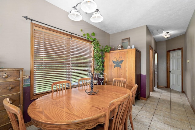 8404 Fossilsaurus Ln, Ash Grove, MO 65604 - dining area featuring light tile patterned floors and baseboards