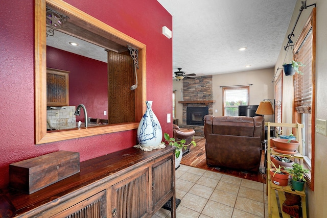 8404 Fossilsaurus Ln, Ash Grove, MO 65604 - hall with a textured ceiling and tile patterned flooring
