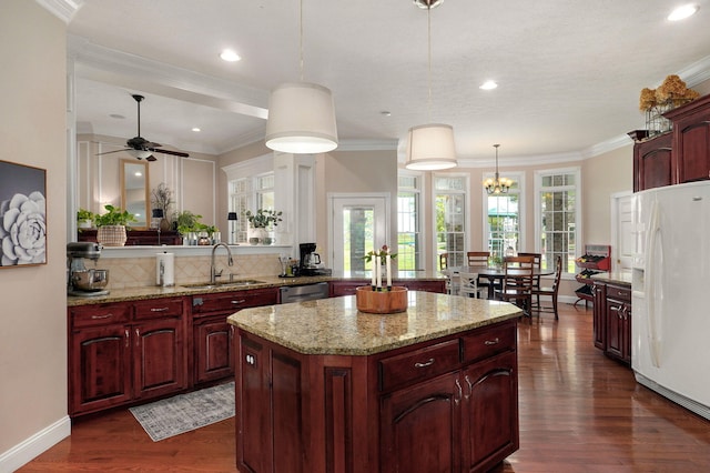 1776 S Gregg Rd, Nixa, MO 65714 - kitchen with white fridge with ice dispenser, dark brown cabinets, backsplash, stainless steel dishwasher, and a kitchen island