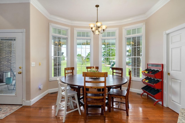1776 S Gregg Rd, Nixa, MO 65714 - dining area featuring healthy amount of natural light, a chandelier, wood finished floors, and crown molding