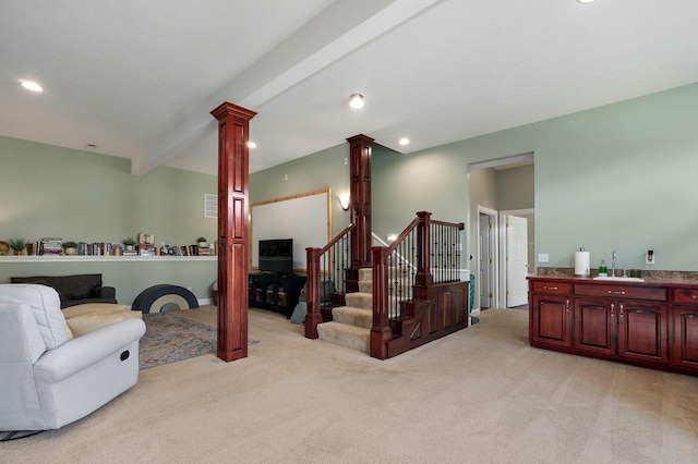 1776 S Gregg Rd, Nixa, MO 65714 - living area featuring ornate columns, light colored carpet, stairway, recessed lighting, and beamed ceiling