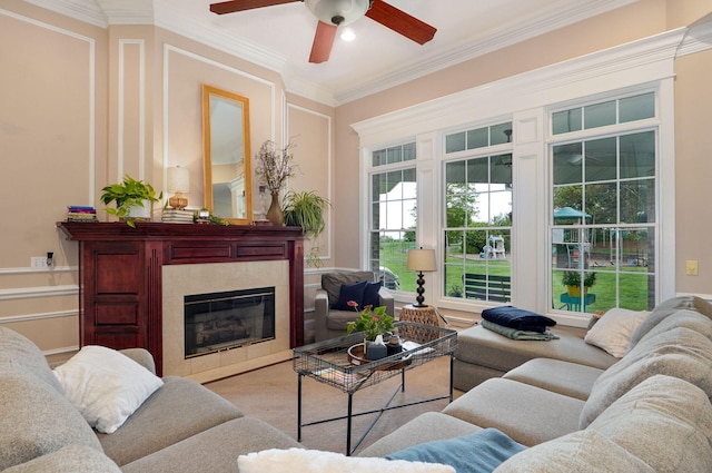 1776 S Gregg Rd, Nixa, MO 65714 - living area with ceiling fan, ornamental molding, a decorative wall, and a fireplace