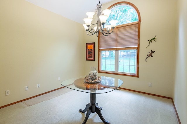 280 Center Rd, Ozark, MO 65721 - dining area featuring a chandelier, plenty of natural light, and carpet