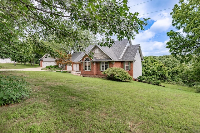 280 Center Rd, Ozark, MO 65721 - view of front of house with driveway, a front yard, an attached garage, and brick siding
