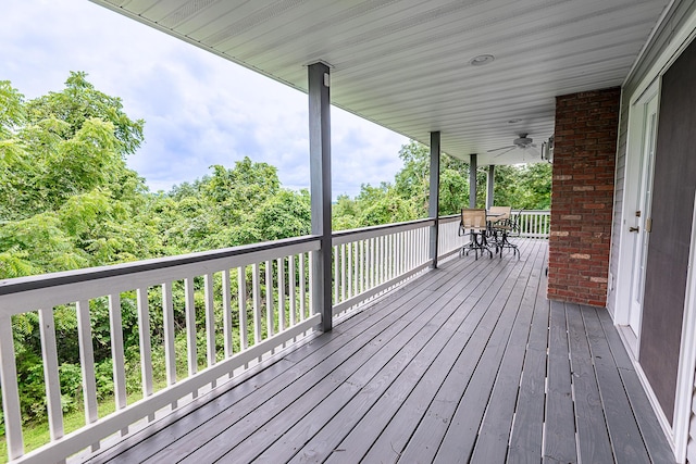 280 Center Rd, Ozark, MO 65721 - wooden terrace featuring ceiling fan and outdoor dining area
