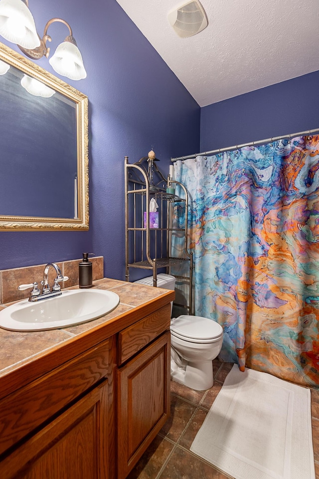 280 Center Rd, Ozark, MO 65721 - full bathroom featuring vanity, a textured ceiling, a shower with shower curtain, and tile patterned flooring