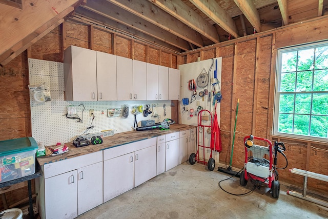 280 Center Rd, Ozark, MO 65721 - kitchen featuring white cabinetry, unfinished concrete flooring, and light countertops