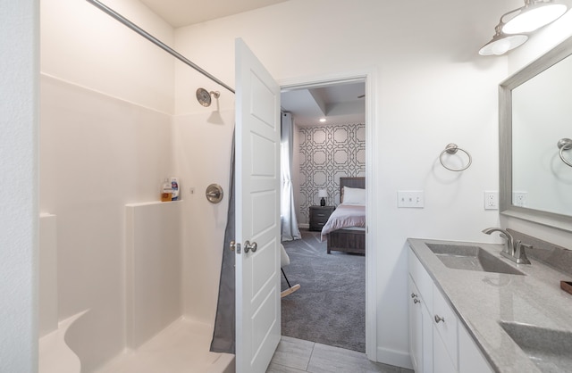 1643 Columbia Ave, Rolla, MO 65401 - ensuite bathroom featuring double vanity and a shower