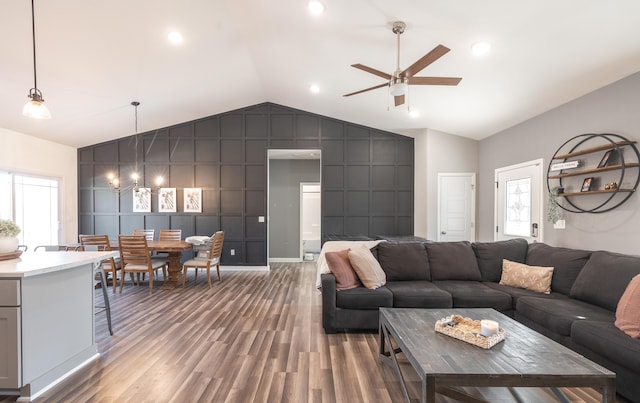 1643 Columbia Ave, Rolla, MO 65401 - living room with vaulted ceiling, ceiling fan, light wood-style flooring, and an accent wall