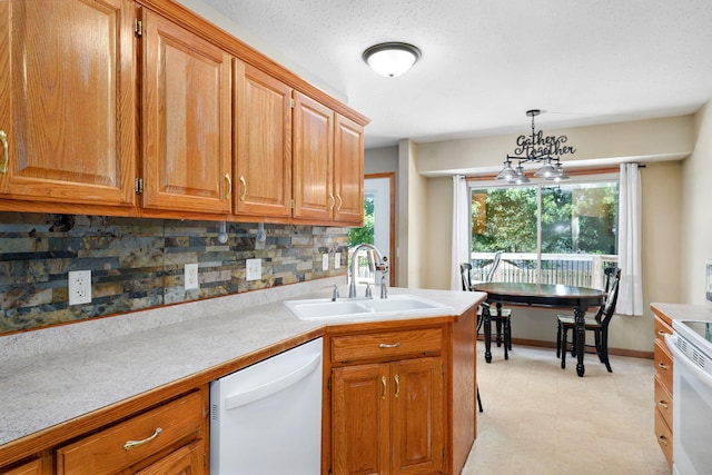 3605 N 30th St, Ozark, MO 65721 - kitchen with white appliances, light countertops, tasteful backsplash, and brown cabinets