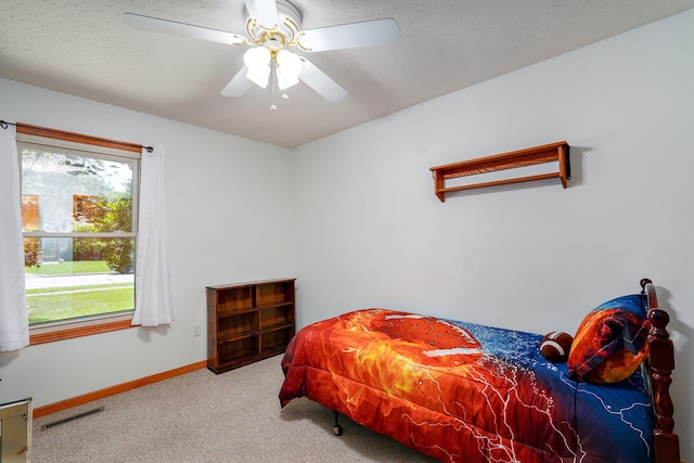 3605 N 30th St, Ozark, MO 65721 - carpeted bedroom featuring baseboards and a ceiling fan