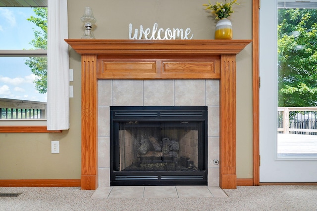3605 N 30th St, Ozark, MO 65721 - detailed view of a tiled fireplace and baseboards