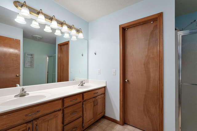 3605 N 30th St, Ozark, MO 65721 - bathroom featuring a shower with shower door and double vanity