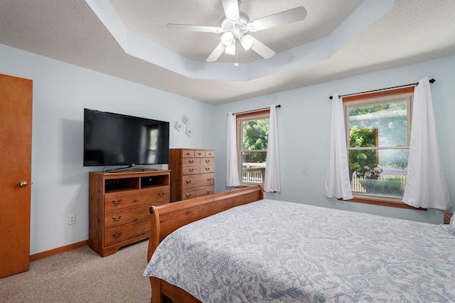 3605 N 30th St, Ozark, MO 65721 - bedroom with carpet floors, a raised ceiling, and a ceiling fan