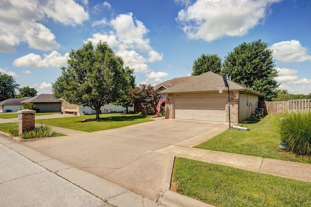 3605 N 30th St, Ozark, MO 65721 - view of front of home with brick siding, driveway, and an attached garage