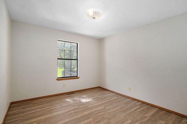 904 N 41st St, Nixa, MO 65714 - empty room with wood finished floors and baseboards