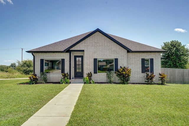 1240 E Keeling Pl, Bolivar, MO 65613 - view of front of home with brick siding and a shingled roof