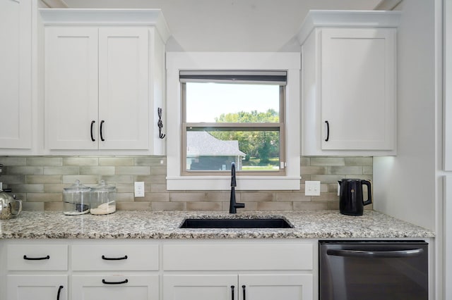 1240 E Keeling Pl, Bolivar, MO 65613 - kitchen with dishwasher, white cabinetry, backsplash, and light stone countertops