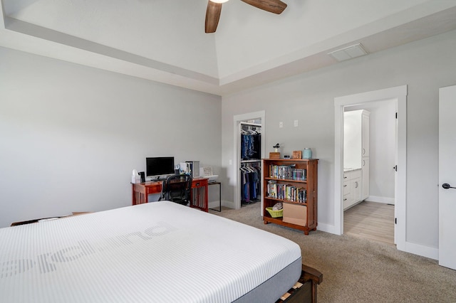 1240 E Keeling Pl, Bolivar, MO 65613 - bedroom featuring light carpet, a walk in closet, ceiling fan, and ensuite bath