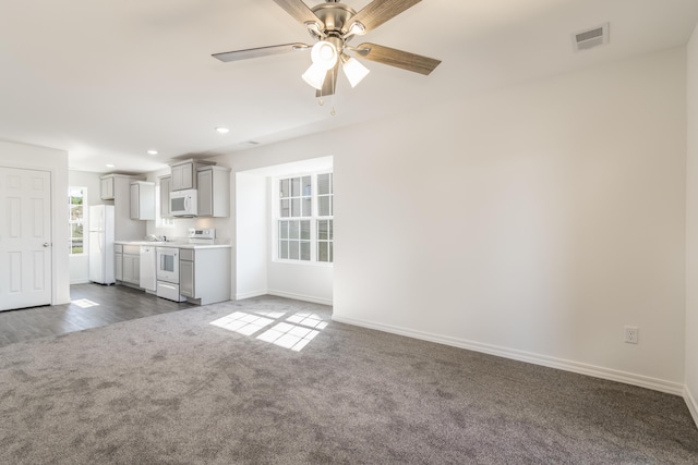 37 Lantern Bay Ln Unit 3, Branson, MO 65616 - unfurnished living room with dark carpet, recessed lighting, and ceiling fan