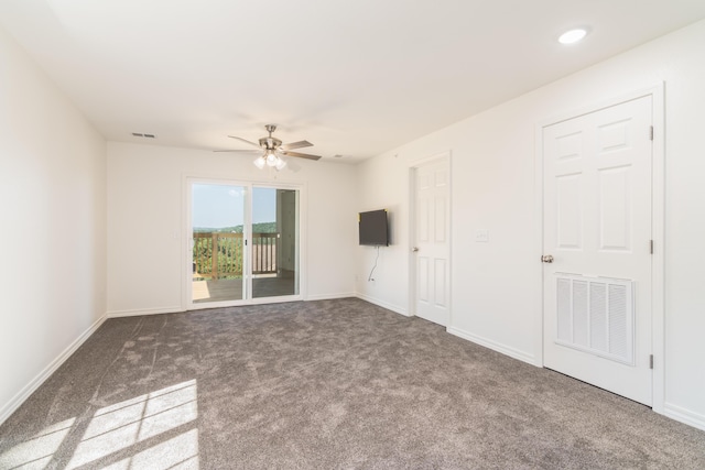 37 Lantern Bay Ln Unit 3, Branson, MO 65616 - unfurnished bedroom featuring access to outside, carpet, and a ceiling fan