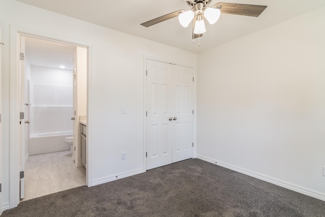 37 Lantern Bay Ln Unit 3, Branson, MO 65616 - unfurnished bedroom with carpet floors, a closet, connected bathroom, and ceiling fan