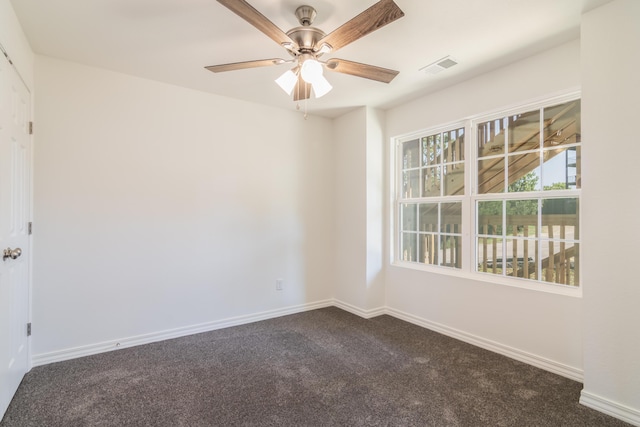 37 Lantern Bay Ln Unit 3, Branson, MO 65616 - unfurnished room with dark colored carpet and ceiling fan