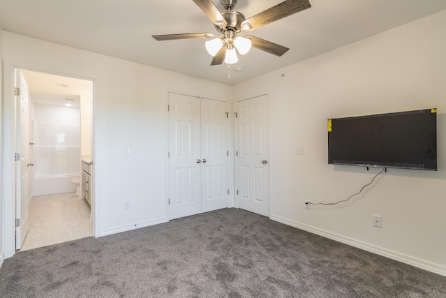 37 Lantern Bay Ln Unit 3, Branson, MO 65616 - unfurnished bedroom featuring carpet, ensuite bathroom, ceiling fan, and a closet