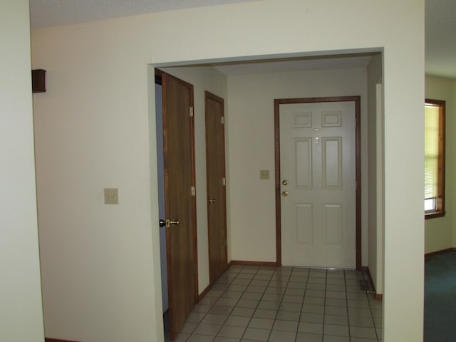 285 Scenic Dr, Forsyth, MO 65653 - corridor featuring baseboards and light tile patterned floors