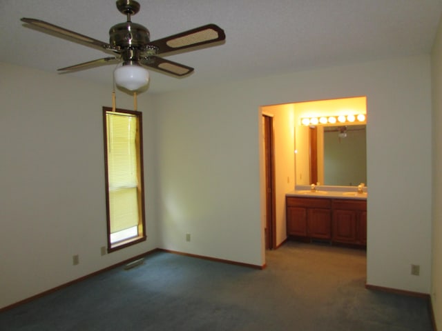 285 Scenic Dr, Forsyth, MO 65653 - unfurnished bedroom featuring light colored carpet and connected bathroom
