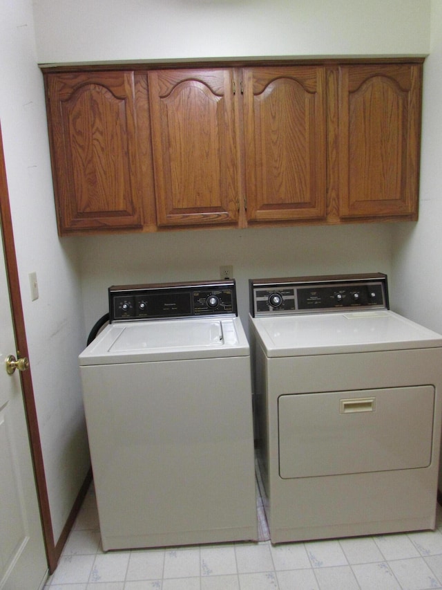 285 Scenic Dr, Forsyth, MO 65653 - washroom featuring washer and dryer and cabinet space