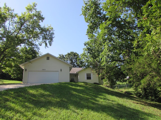 285 Scenic Dr, Forsyth, MO 65653 - view of front of house with a garage, a front lawn, and concrete driveway