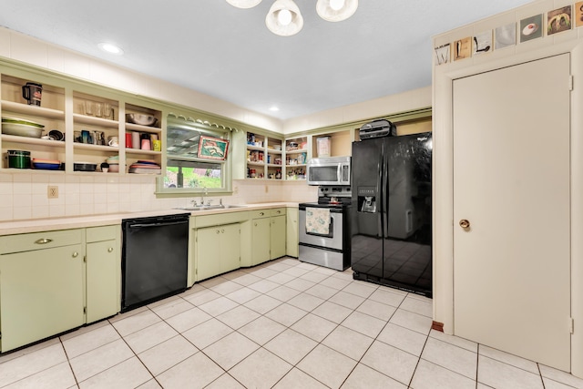 3637 State Highway Y, Forsyth, MO 65653 - kitchen featuring black appliances, open shelves, green cabinetry, light countertops, and tasteful backsplash