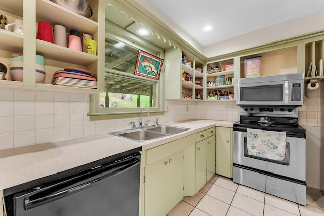 3637 State Highway Y, Forsyth, MO 65653 - kitchen with appliances with stainless steel finishes, open shelves, light countertops, and light tile patterned floors