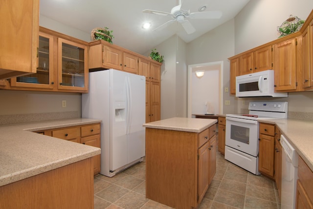 618 Parnell Cir, Branson, MO 65616 - kitchen featuring white appliances, a ceiling fan, a center island, lofted ceiling, and glass insert cabinets