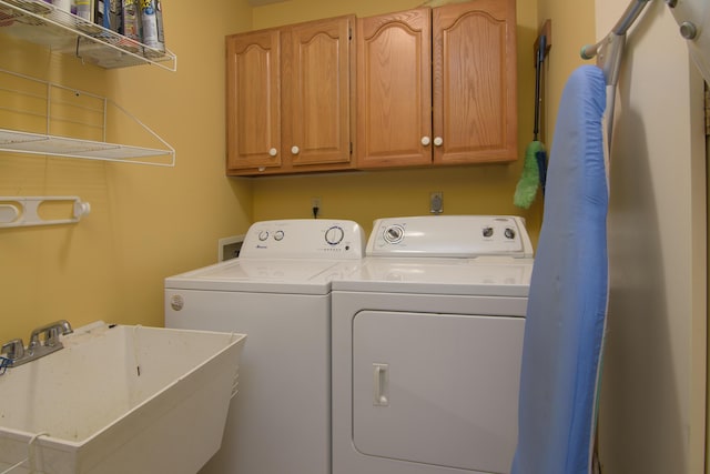 618 Parnell Cir, Branson, MO 65616 - laundry room with washer and dryer and cabinet space