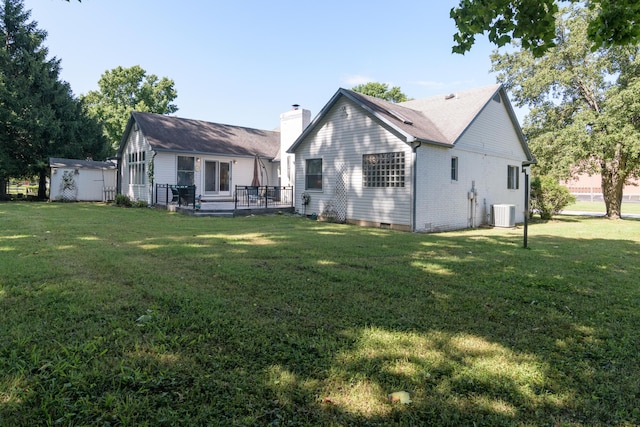 618 Parnell Cir, Branson, MO 65616 - rear view of house featuring a chimney, a lawn, crawl space, and a deck