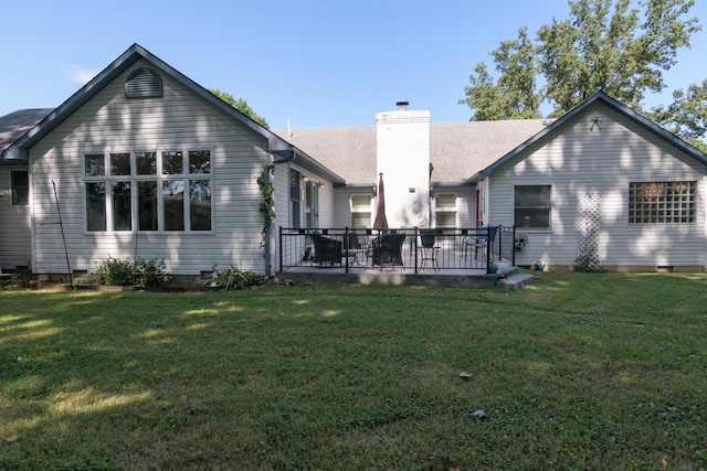 618 Parnell Cir, Branson, MO 65616 - back of property featuring a lawn, a chimney, and a shingled roof