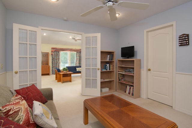 618 Parnell Cir, Branson, MO 65616 - living room with french doors, carpet, ceiling fan, and a desk