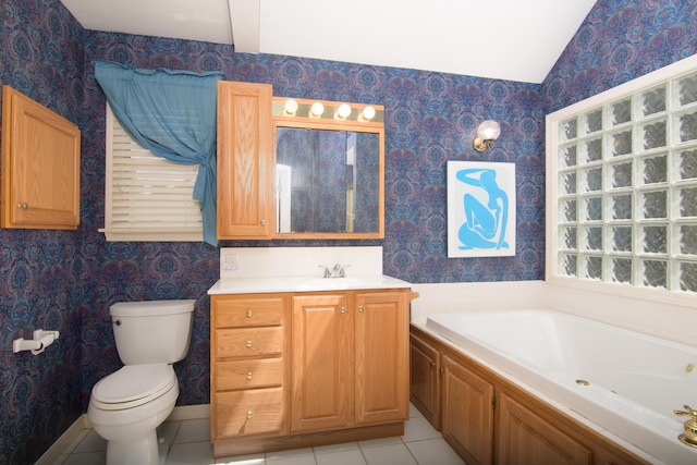 618 Parnell Cir, Branson, MO 65616 - full bath featuring wallpapered walls, a tub with jets, vanity, tile patterned flooring, and vaulted ceiling