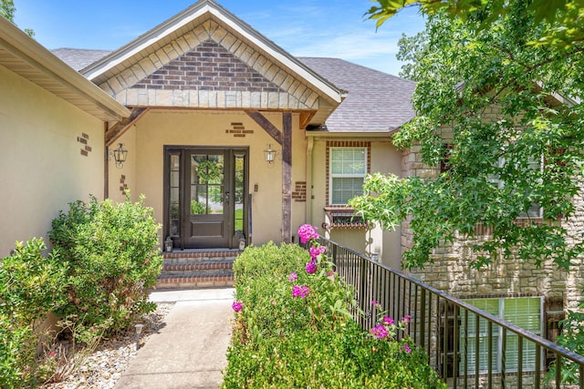277 Country Bluff Dr, Branson, MO 65616 - entrance to property featuring a shingled roof, stucco siding, and stone siding