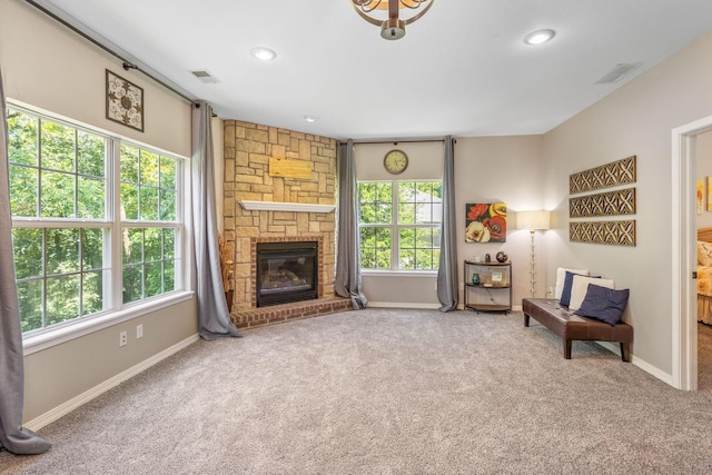 277 Country Bluff Dr, Branson, MO 65616 - carpeted living area with plenty of natural light, a fireplace, and recessed lighting