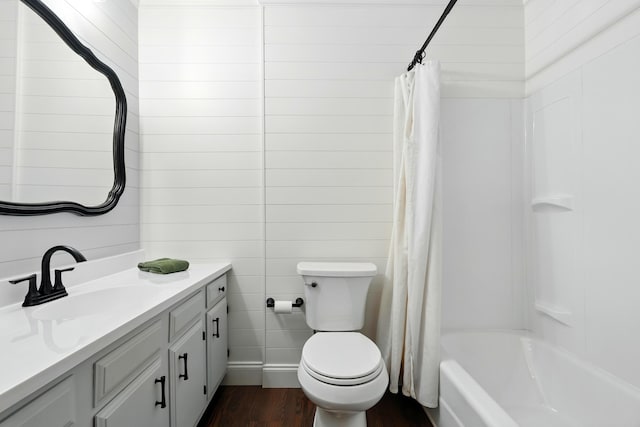 107 Oakwood Dr, Branson, MO 65616 - full bath with vanity, wood finished floors, and shower / tub combo