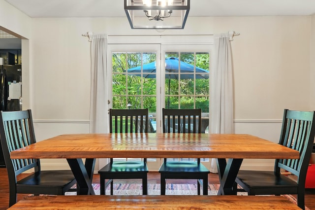 107 Oakwood Dr, Branson, MO 65616 - dining space with a chandelier and wood finished floors