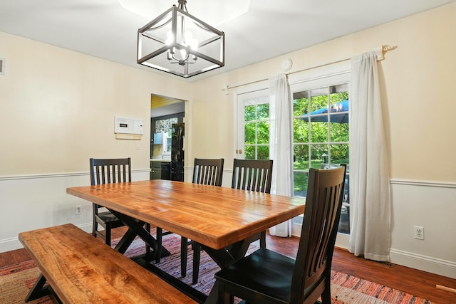 107 Oakwood Dr, Branson, MO 65616 - dining space with a chandelier and wood finished floors