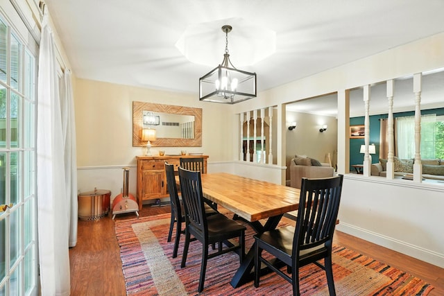 107 Oakwood Dr, Branson, MO 65616 - dining area featuring wood finished floors and a chandelier