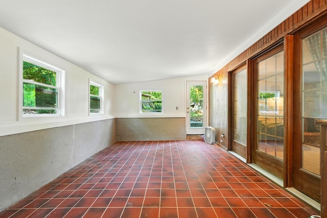 107 Oakwood Dr, Branson, MO 65616 - unfurnished sunroom featuring vaulted ceiling