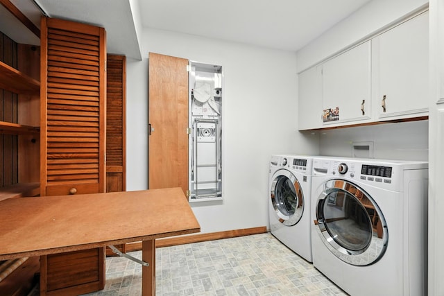 107 Oakwood Dr, Branson, MO 65616 - laundry room with cabinet space and washer and dryer