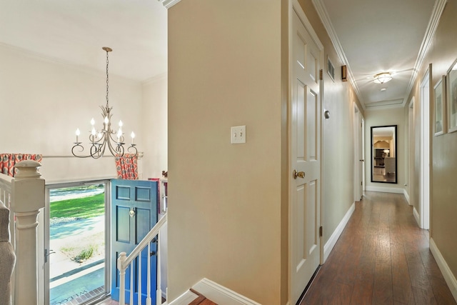 107 Oakwood Dr, Branson, MO 65616 - hallway featuring an upstairs landing, crown molding, a chandelier, and hardwood / wood-style flooring