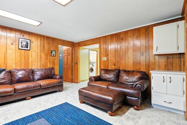 107 Oakwood Dr, Branson, MO 65616 - living room with washer / clothes dryer and wooden walls